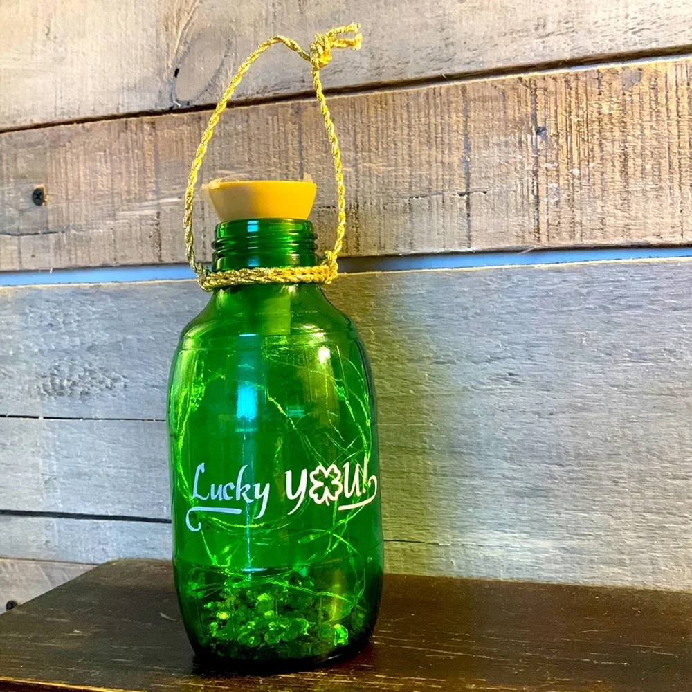 ‘Lucky You’ logo green barrel lantern